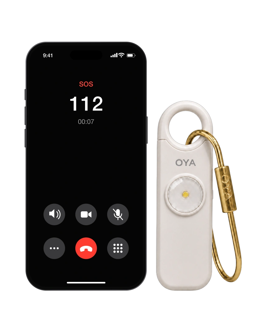 OYA Pearl Sand, Anti-agression, sirène 130 dB et lampe, à côté d’un téléphone qui appelle les secours